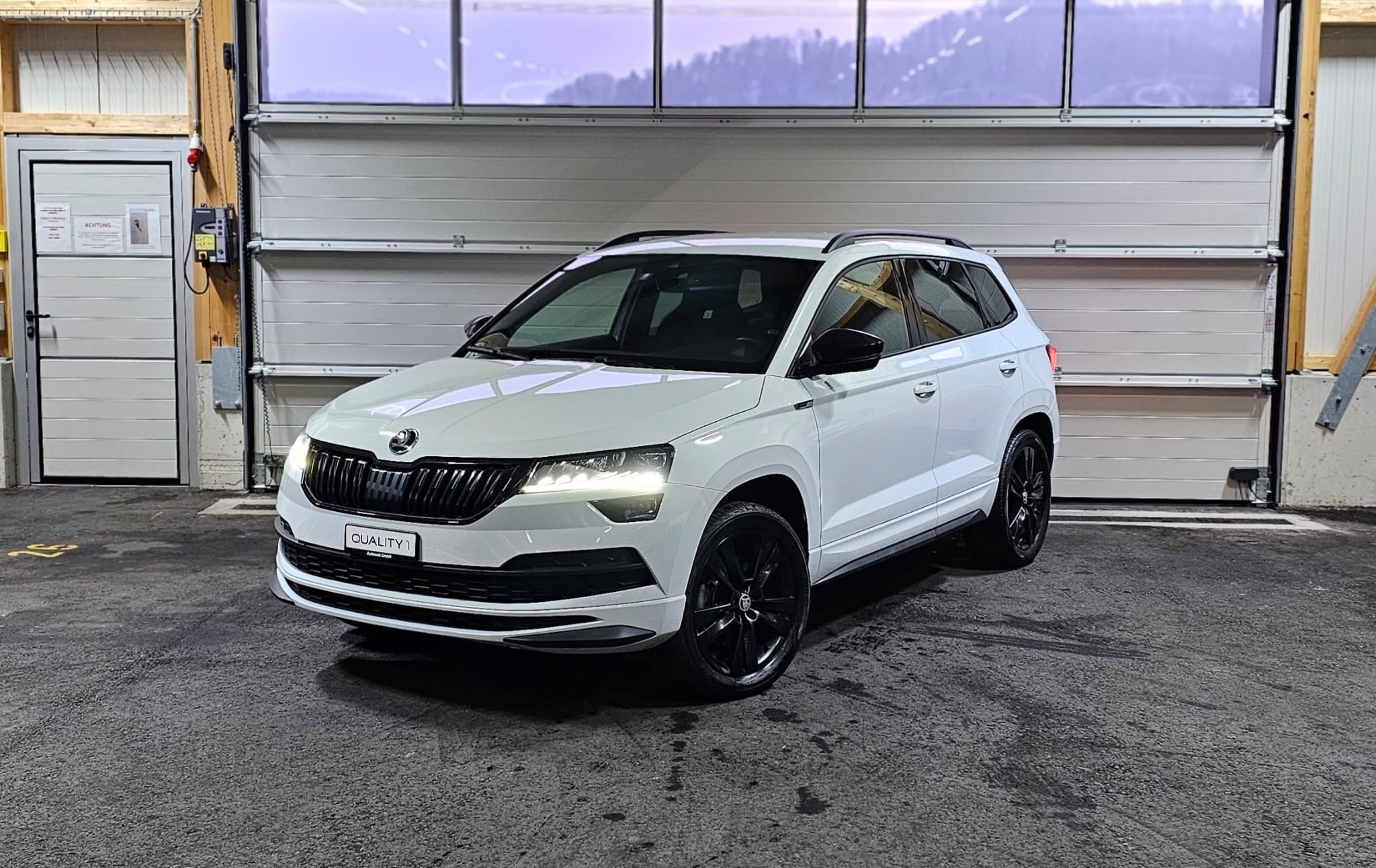 SKODA Karoq 2.0 TSI SportLine 4x4 DSG *CH-Fahrzeug*