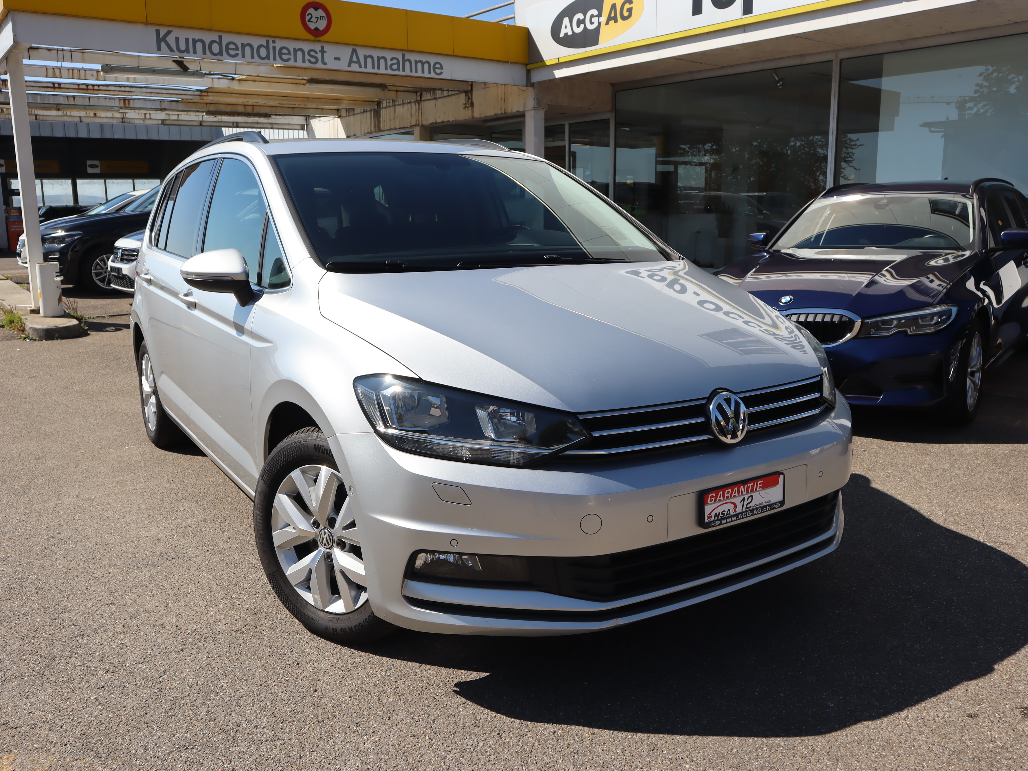 VW Touran 1.6 TDI BlueMotion Technology Comfortline DSG ** 7-Plätzer ** Gr-Navi mit RF-Kamera ** Anhängerkupplung ** Frisch ab M